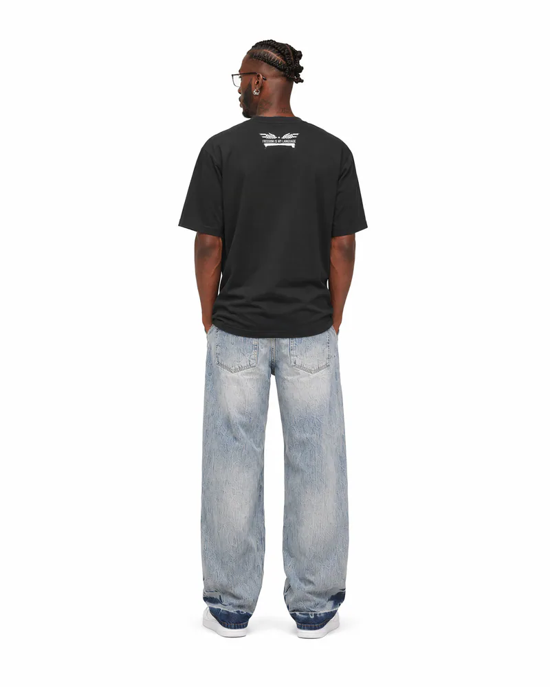 The Foundation Tee Decree in Onyx Black, worn, back